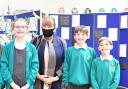 Pupils: Parish Council Chairman Dorothy Griffin with Notley Green School council representatives Lucy Ellis, Noah O’Sullivan and Dylan Roberts