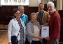 Positive - Simon Brown from A Rocha UK presenting the bronze award to the church's team