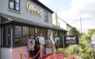 Exciting - Dame MP Priti Patel with Mr Abdul Muhith and his family at the grand opening of Maria’s Indian Dining