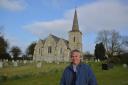 Mike Gray outside the church on Foulness Island