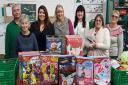 Holmes & Hills employees donated advent calendars to Braintree area foodbank