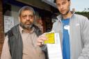 Fined – customer Andy Pearson with newsagent Chitranjan Patel outside his shop