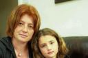Sophie Barker, eight, with mum Tracey Barker