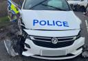 Smashed - the police vehicle was left severely damaged following the incident
