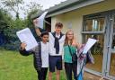 HAPPY FACES: Honywood School students celebrate their results