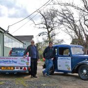 Trevor Fleuty, Terry Bonner and Heather and Albert Clements with the Austin Seven named 'Bluebell' and support trailer