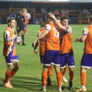 Late show: Braintree Town celebrate Kyran Clements' equaliser against Canvey Island.