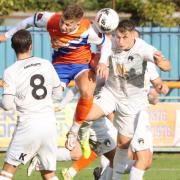 Heads up: Braintree Town striker Will Davies wins a header during his side's 2-0 win over Weston super Mare.