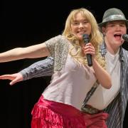 Fun - Actors Rhianna Gregory and Fionn Crickett on stage during a rehearsal for High School Musical