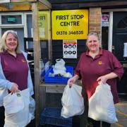 Amazing - First Stop Centre's manager Rachael Stone and  First Stop Centre's education and learning co-ordinator, Jan Russell with bags of food