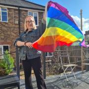 Welcoming - Braintree Foyer resident Jane with her pride flag