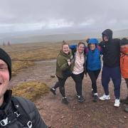 Challenge complete - Reach Group Community Projects members ascending to the Pen Y Fan  peak