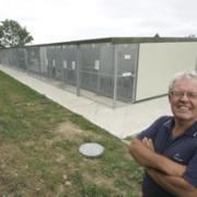 New home: Bob Ferdinando, general manager of the RSPCA Centre in Wethersfield, celebrates the opening of the new kennels.