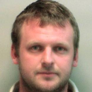 Charlie Tomlinson smuggled an estimated 23kg of heroin, 10kg of cocaine and 23,000 ecstasy tablets (UKBA/PA)