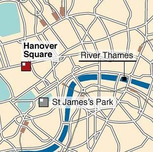 A woman was pronounced dead at the scene after building work fell on her in Hanover Square in London's expensive Mayfair