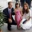 The Duke and Duchess of Cambridge meet four-year-old Maeve Low during a visit to a Rolls-Royce factory in Singapore