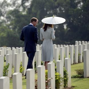 The Duke and the Duchess of Cambridge pay their respects at the Kranji Commonwealth War Memorial in Singapore. (AP/Bryan van der Beek)
