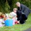 Shadow home secretary Yvette Cooper and shadow police minister David Hanson lay floral tributes in Hattersley