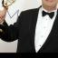 Eric Stonestreet and his Emmy award, which he won for best supporting actor in a comedy series for his role in Modern Family (AP)