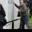 A man attacks a prison van believed to contain Mark Bridger as it leaves Aberystwyth Magistrates' Court