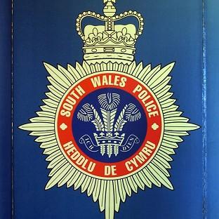 South Wales Police officers have arrested a man in connection with several road traffic collisions