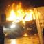 A burned out car during disturbances which erupted in east Belfast