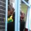 Mark Bridger (left) is led from Mold Crown Court after pleading not guilty to the abduction and murder of five-year-old April Jones