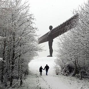 Richard and Samantha Stretton, from Newcastle, enjoy a walk at the Angel of the North in Gateshead
