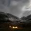 Climbers make their way off Bidean nam Bian in the Scottish Highlands by torchlight