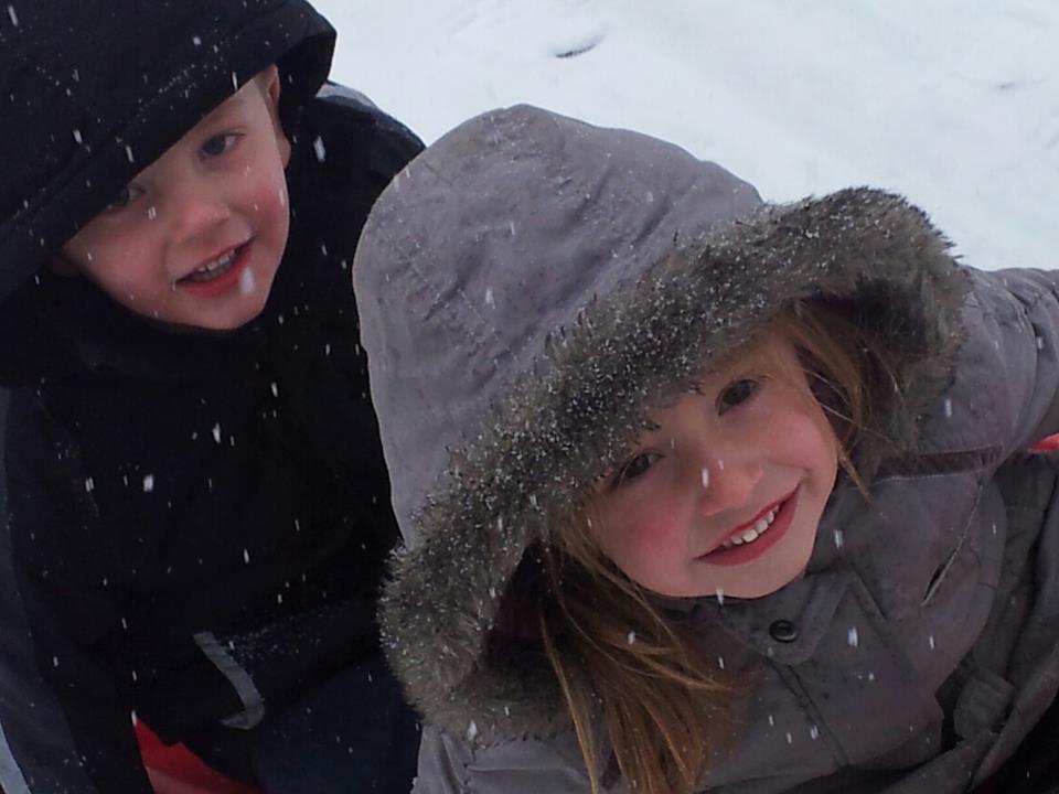 Tali Catley, five, and brother Harvey, four, playing in the snow at Great Notley Bowl.