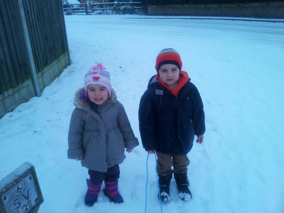 Rhys Littlefield, four, and sister Erin, two, of Laburnum Way, Witham, on their way to Rickstones Park.