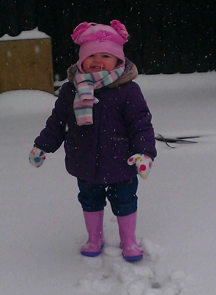 Reagan Plumb, aged 16 months, enjoying her first experience of snow in Silver End