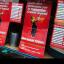 A masked armed robber collapsed and died after being disarmed and pinned down by customers in a Ladbrokes bookies