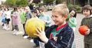 Ready, shoot: Pupils take aim.