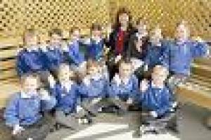 Very proud: It's celebration time at Howbridge Infants School.