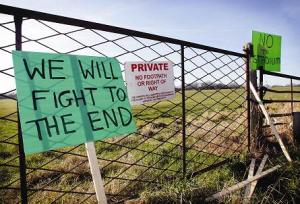 Trespass: farmer Andrew Crowe blames residents for contaminating his family's land. 
