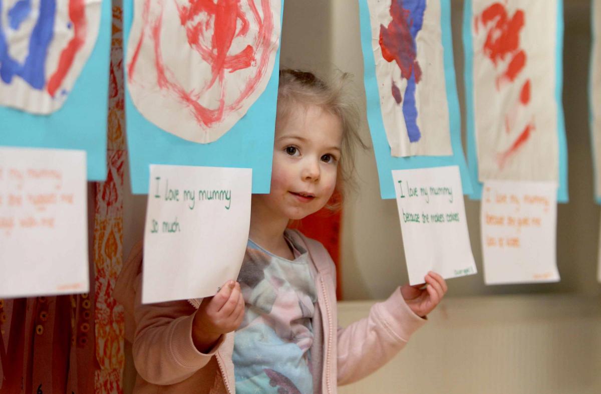 Niamh Collison at an event at Springlands nursery, in Colchester, when children were asked to draw and paint pictures of their mums and nans.
