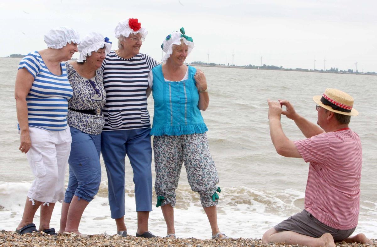 Members of the Women's Institute dipped their toes in the sea to mark the organisation's centenary.