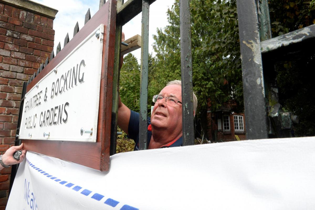 IMPROVEMENTS: Brian Streeter refits the gardens sign