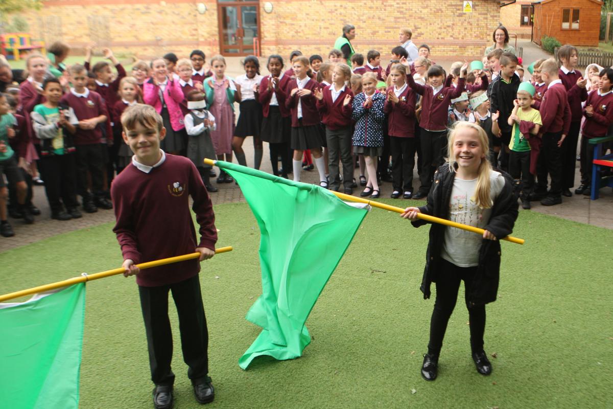 FLAGS: Children wore green to honour the NSPCC