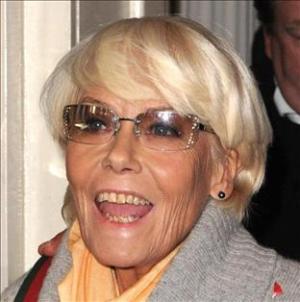 Wendy Richard waves after tying the knot with John Burns