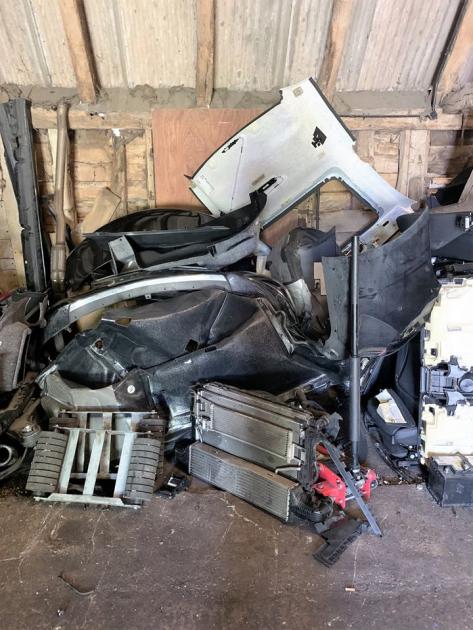 Police launch investigation after uncovering hidden stash of stolen cars and parts 