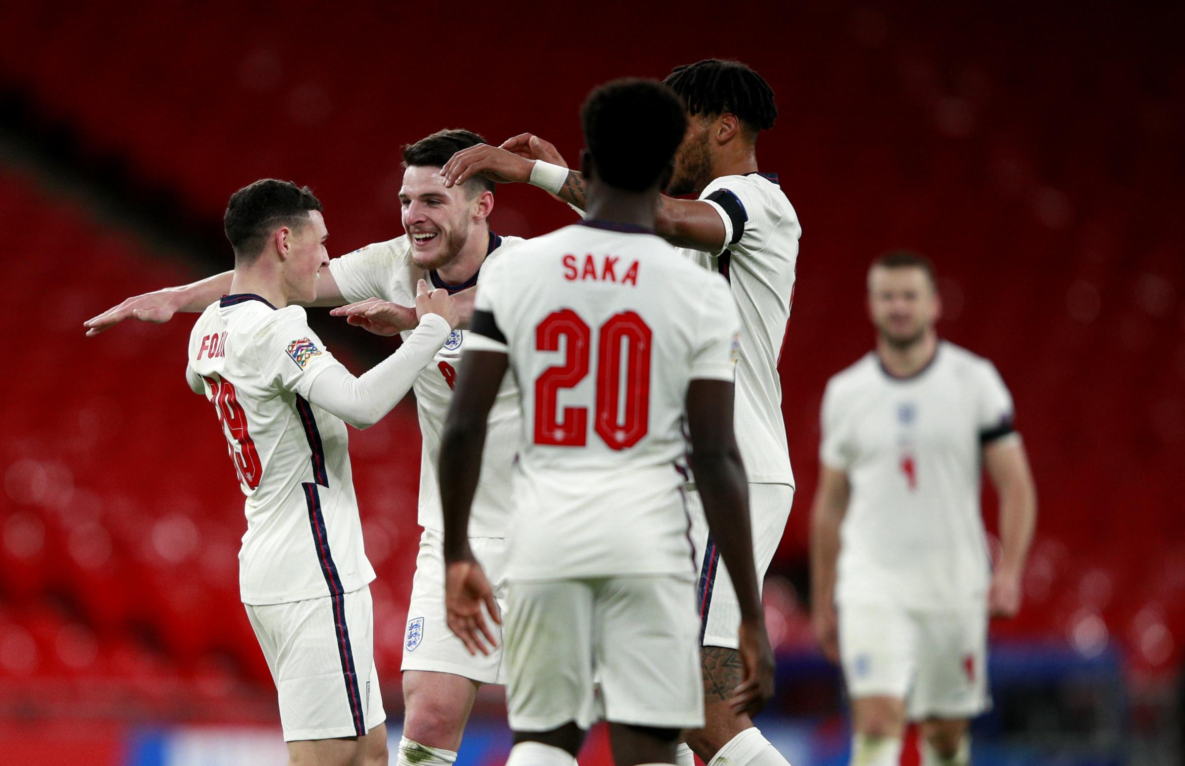 Englands Phil Foden (left) celebrates scoring his sides fourth goal of the game with team-mates during the UEFA Nations League Group A2 match at Wembley Stadium, London. PA Photo. Picture date: Wednesday November 18, 2020. See PA story SOCCER England.