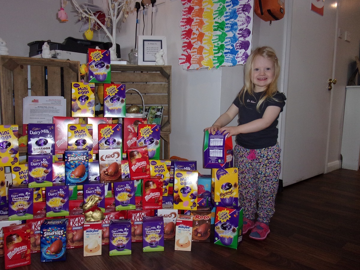 So sweet - Rosie Heppleston adds her egg to the donation mountain at Busy Bees Day Nursery