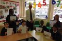 Winner: Nick with some of his pupils at Powers Hall Academy