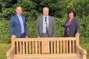 Councillor Frankie Ricci, council chairman Andrew Hensman, and councillor Wendy Schmitt with one of the benches