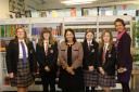 Priti Patel with student librarians and reading intervention students Tiffany, Ruby, Daisy and Sydney with Head of School Sherry Zand