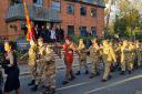 The parade marches past Causeway House in Braintree