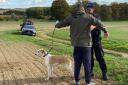 An Essex Police rural engagement officer searches a man on Peacock Hill near Littlebury
