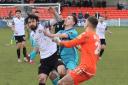 Gripping stuff: Braintree Town's Matt Rush challenges for the ball against Hungerford Town